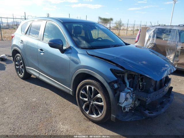  Salvage Mazda Cx